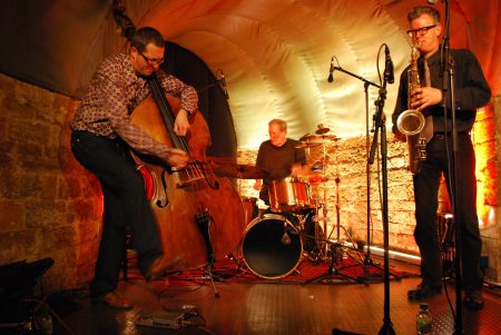 Meinrad Kneer, Bill Elgart and Ab Baars at Jazzkeller Sauschdall in Ulm, Germany (photo from Karin Mitschang)